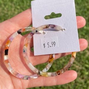 Colorful large hoops. Lightweight/versatile. Great for many outfits!